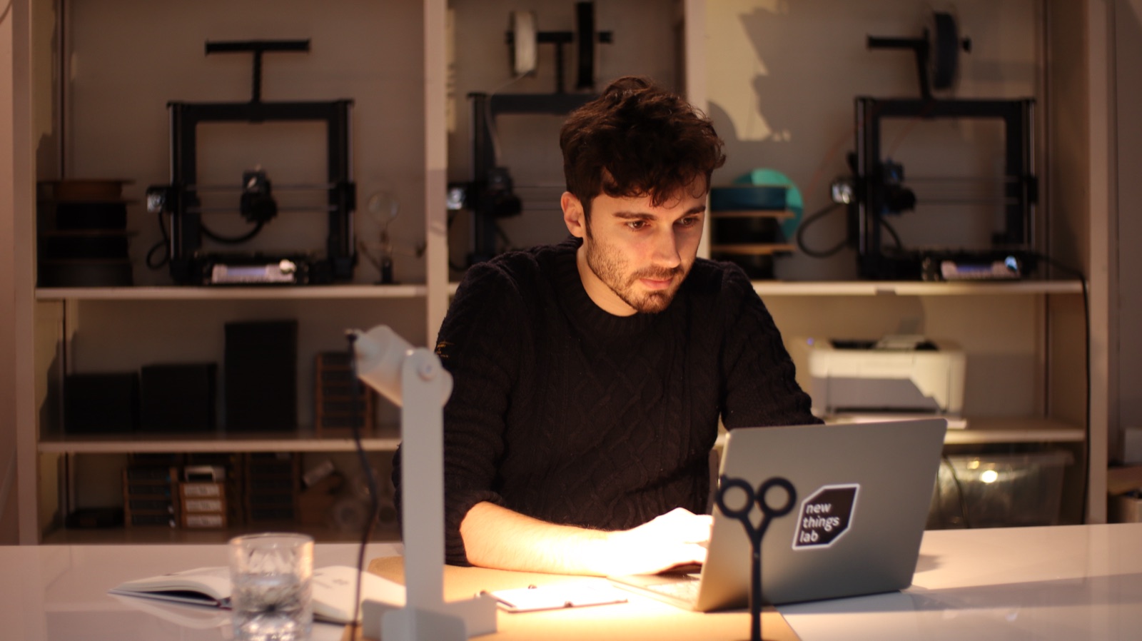 Industrial designer at work with 3D printers